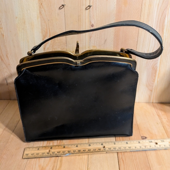 rosen feld Handbags - Rosenfeld Vintage Black Leather Handbag with Gold Accents